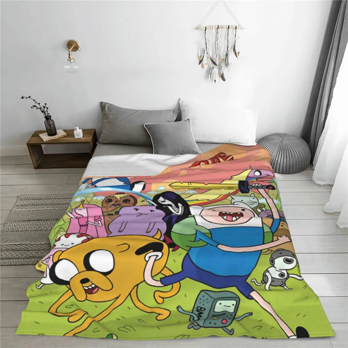 A colorful cartoon blanket featuring various animal characters and adventure themes.