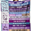A purple and teal throw blanket featuring inspirational text about love, family, and support.
