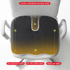Ergonomic U-shaped massage seat cushion showing targeted release zones on a gray cushion.