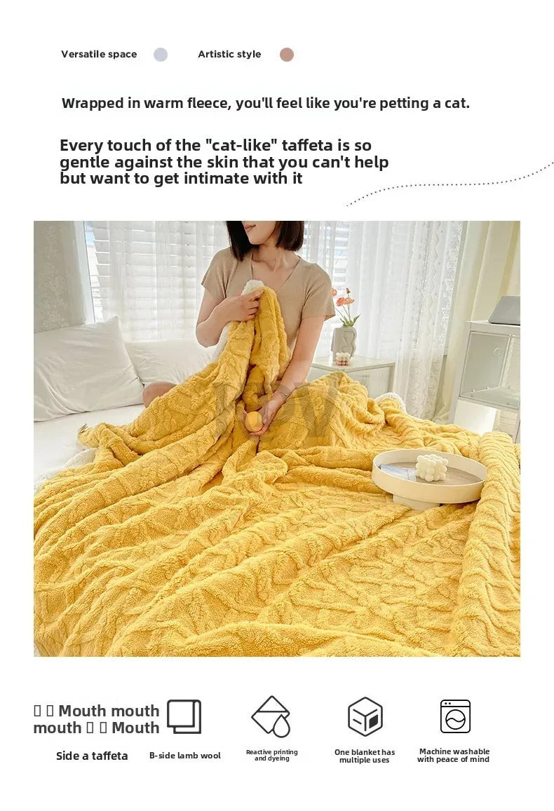 A thick yellow fleece blanket is draped on a bed, showing its soft texture and warmth.