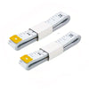 A set of two flexible body measuring tapes with white and gray markings and yellow clasps.