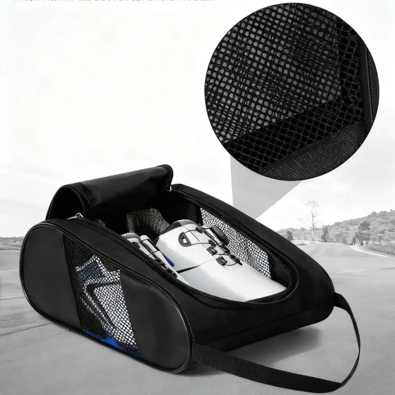 A black portable shoe carrier bag with a mesh insert is shown open on a gray surface.