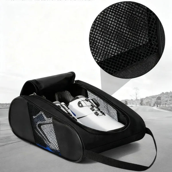 A black portable shoe carrier bag with a mesh insert is shown open on a gray surface.