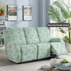A light green heavy-duty chenille recliner sofa slipcover sitting on a floor with potted plants.