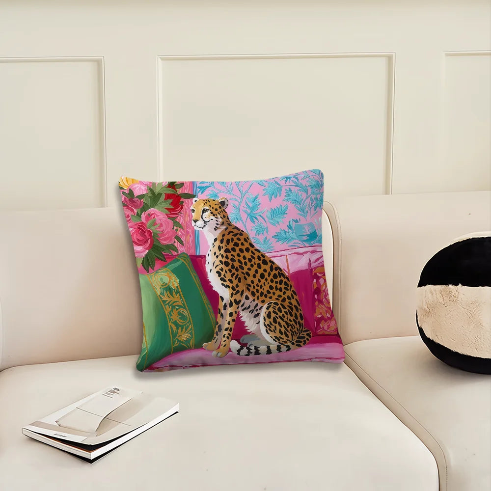 A decorative cushion cover featuring a leopard print cheetah and pink floral and tropical plant patterns.
