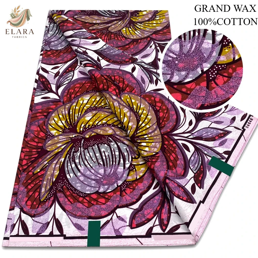 A vibrant African wax print fabric featuring a floral pattern in shades of purple, pink, and yellow.