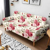 Elegant watercolor rose stretch sofa cover featuring pink and green floral patterns on a sofa.