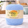 A skein of light blue silk bamboo blend yarn is shown on a white surface with a label indicating 1 pack equals 10 pieces and 