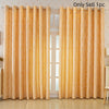 A pair of luxurious gold blackout curtains with a feather jacquard pattern hanging in a window.