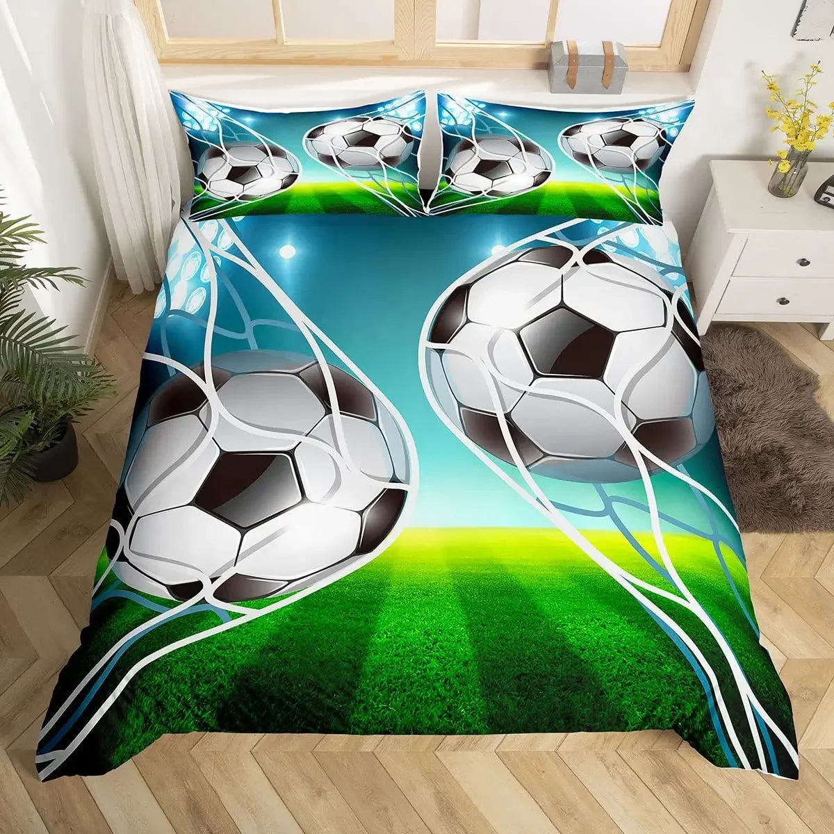 A football themed duvet cover set featuring a soccer ball design on a green field background.