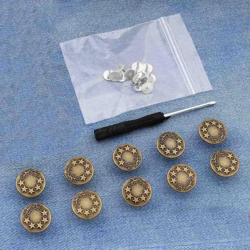 Silver metal button pins are displayed on a translucent white pouch against a blue fabric background.