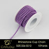 A spool of purple rhinestone cup chain, 10 yards long, is shown on a white background.