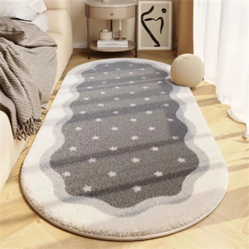 A light gray and white seasonal decor rug with a scalloped edge and subtle star pattern on a wooden floor.