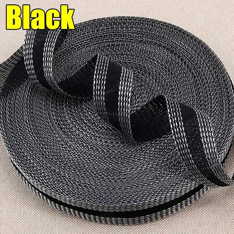 Roll of black iron-on hem tape for pants and jeans