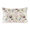 A square silk pillowcase with a pale background featuring a floral print of purple and green leaves and small blue flowers.