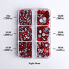 A clear plastic container holds various sizes of red and silver glass rhinestones categorized by SS6, SS10, SS10, SS30, SS20,