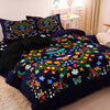 A set of dark blue duvet covers featuring a colorful floral and butterfly print.