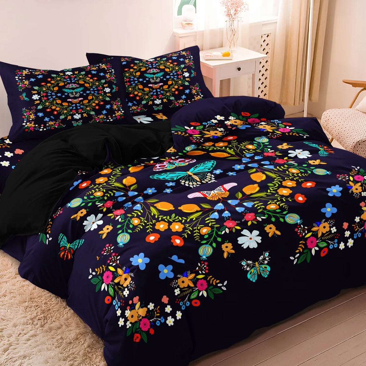 A set of dark blue duvet covers featuring a colorful floral and butterfly print.