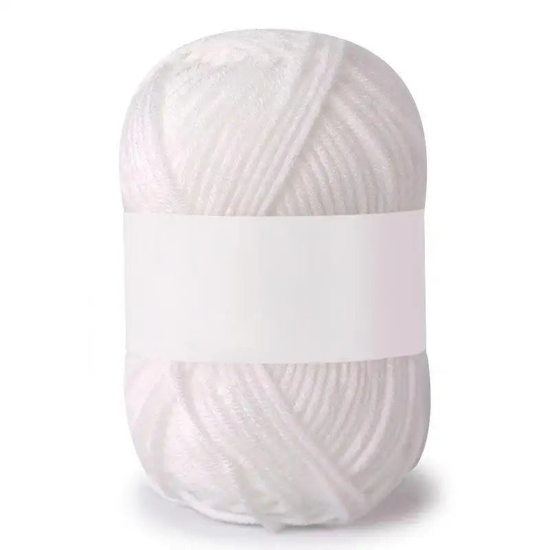 A ball of white soft milk cotton knitting yarn