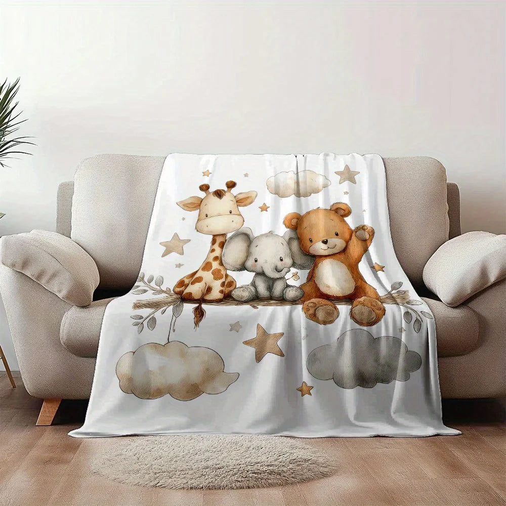 A white flannel blanket featuring cute cartoon animals like a giraffe and a bear sitting on clouds.