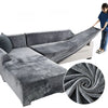 Gray velvet sofa cover for an L-shaped sectional sofa with a matching throw blanket.