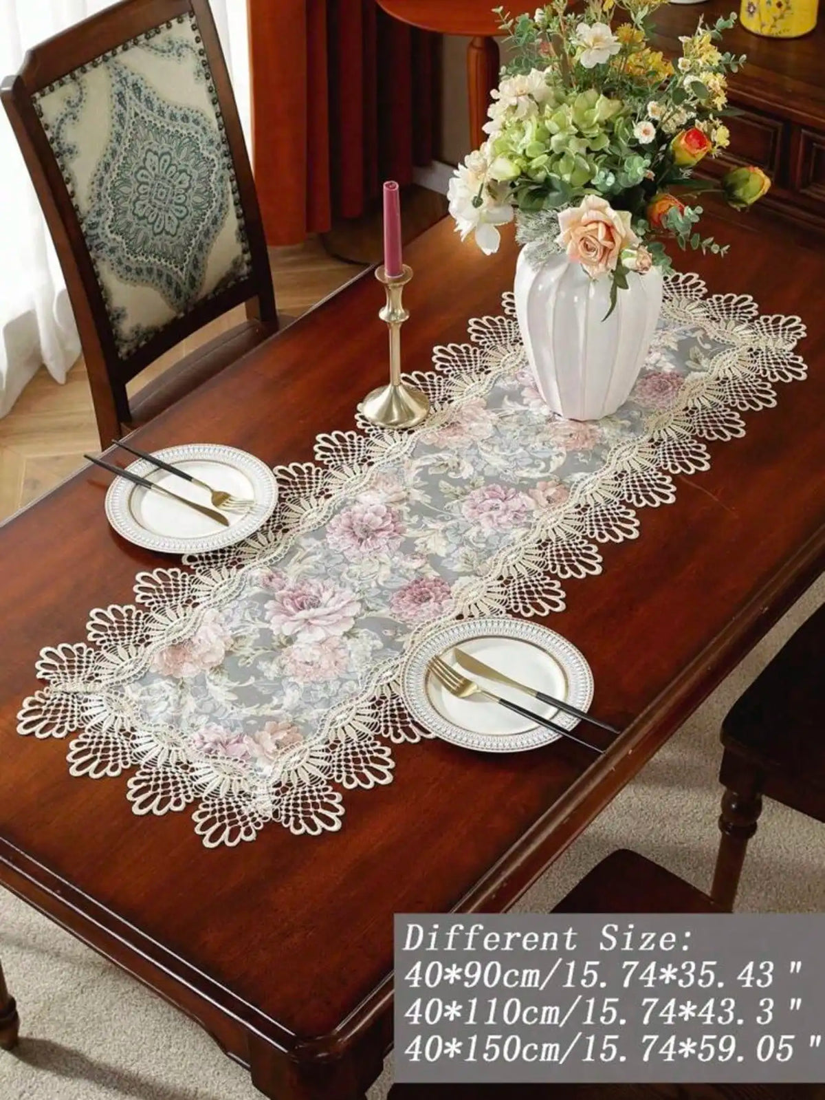 Elegant jacquard lace table runner displayed on a wooden table with place settings and floral arrangement.