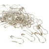 A pile of silver safety bulb pins for knitting and sewing.