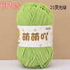 A ball of 6 pieces of bright lime green chenille yarn labeled as 21 light silk yarn.