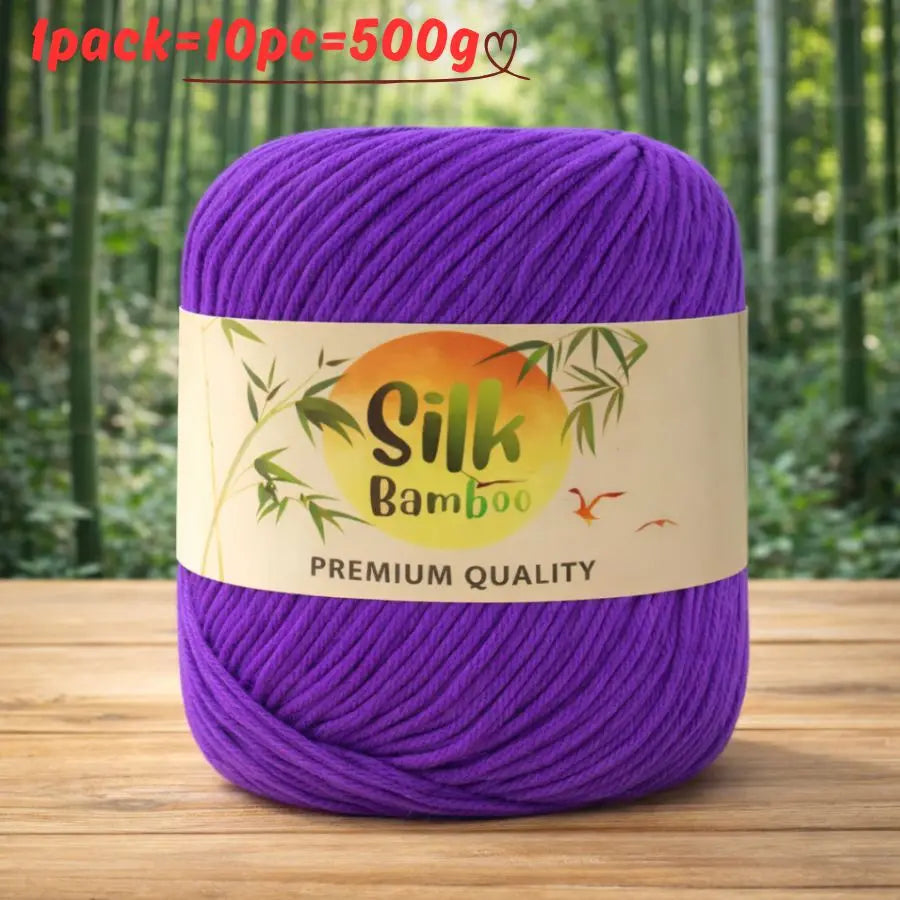 Purple silk bamboo blend yarn skein with a label indicating premium quality