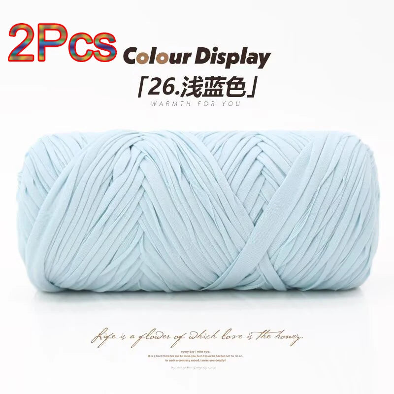 Two skeins of light blue elastic yarn displayed for crafting