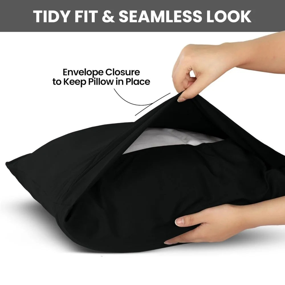 A hand is shown closing an envelope closure on a black microfiber pillow cover to keep the pillow in place.