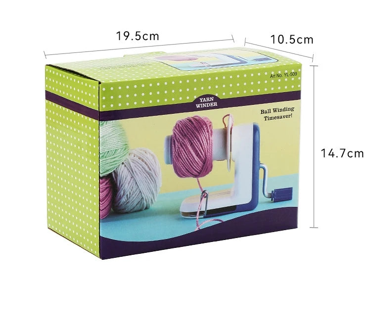 A box of yarn winder with a purple ball winding mechanism and green polka dot packaging.