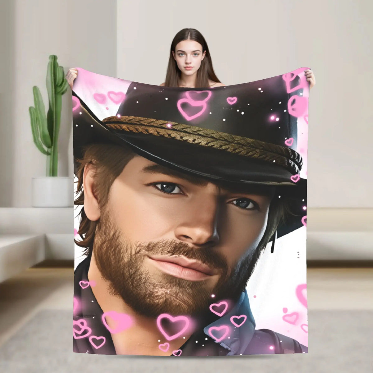 A poster featuring a man with a beard wearing a hat and a pink heart pattern, with a woman visible above him.