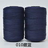 Two spools of dark blue hand knitting and crochet cord for crafting