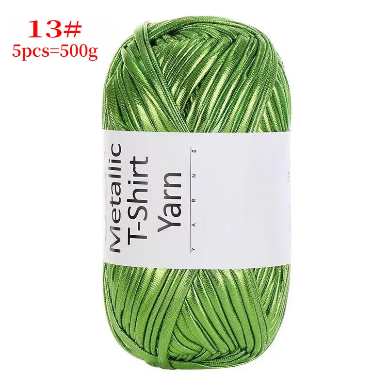 A ball of metallic green T-shirt yarn for crochet and DIY crafts