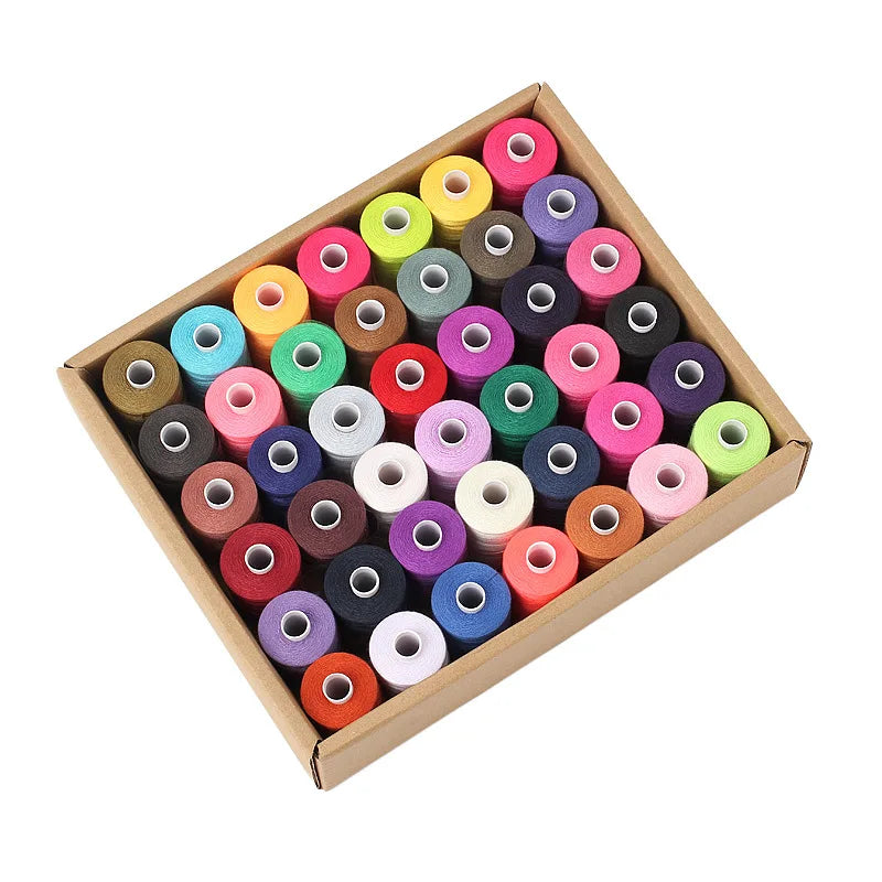 A wooden box filled with 42 colorful polyester thread spools for sewing and quilting.