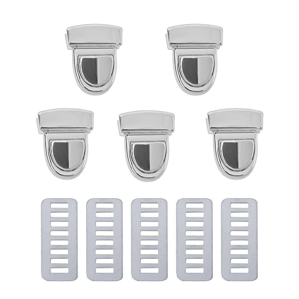 A set of five silver metal bag lock clasps for handbags and totes.