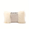 A cushion cover featuring a light cream or beige faux fur exterior with a silver sequin fabric lining.