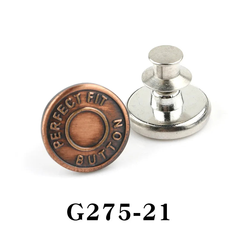 A round copper button pin with the text PERFECT FIT BUTTON engraved on it, shown next to a silver pin.