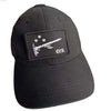 Black baseball cap with an embroidered pirate flag patch featuring a hook and loop backing