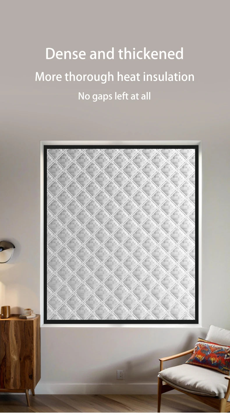 A textured gray thermal door curtain installed in a white frame, designed for heat insulation and privacy.
