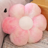 A pink and white sunflower plush flower cushion with soft, fluffy texture.