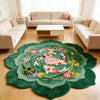 Round rug with a green background featuring a pattern of koi fish and pink flowers on a light wooden floor.