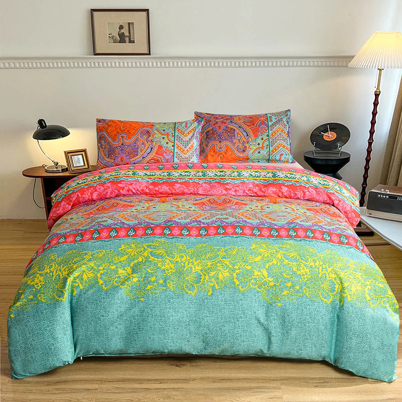 A vibrant floral print duvet cover set featuring shades of orange, pink, and yellow on a teal background.