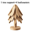 A wooden tree support with four leaf coasters made of natural wood.