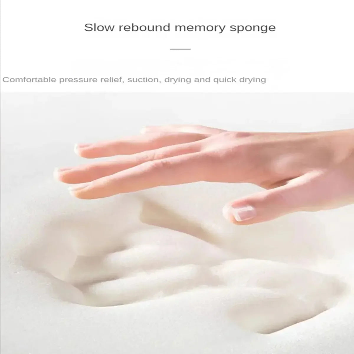 A hand is pressing into a white memory sponge or foam material to demonstrate pressure relief and suction.