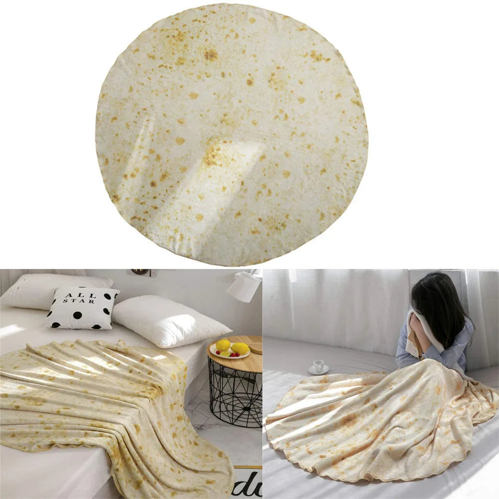 A light beige blanket throw with a pattern of scattered orange and yellow spots, draped over a white surface.