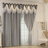 Gray blackout curtains with white wave pattern detail hanging in a window.