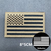 A rectangular USA flag patch made of woven material with a reflective finish and hook and loop backing.