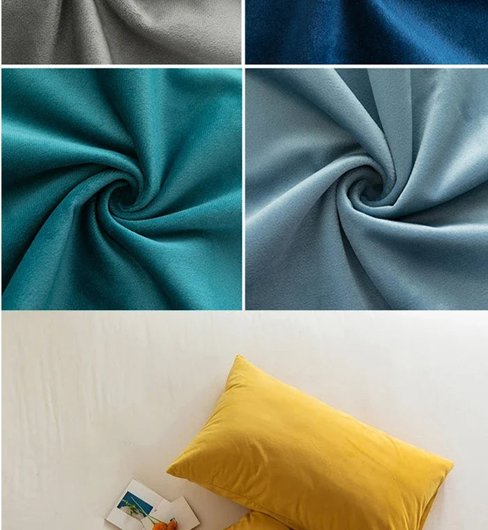 A collection of velvet fabric swatches in shades of teal, blue, gray, and yellow.